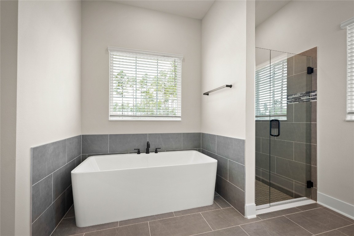 36199 Pitch Lane Hilliard, FL 32046 - Photo 32 of 40 a white bath tub sitting next to a shower