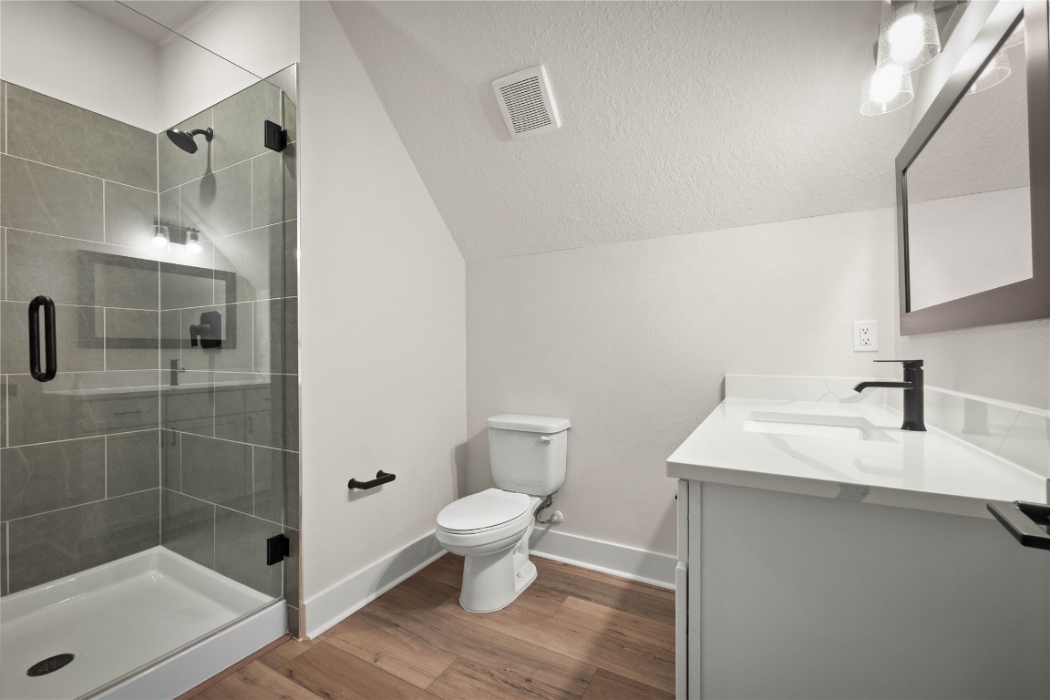 36199 Pitch Lane Hilliard, FL 32046 - Photo 35 of 40 a bathroom with a sink toilet and shower