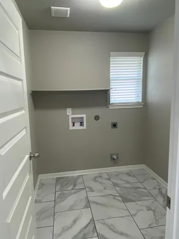 a view of a room with a window