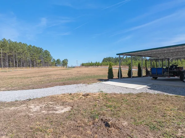 a view of a hallway with seating area