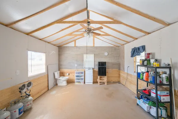 a view of a swimming pool with an outdoor space and seating area