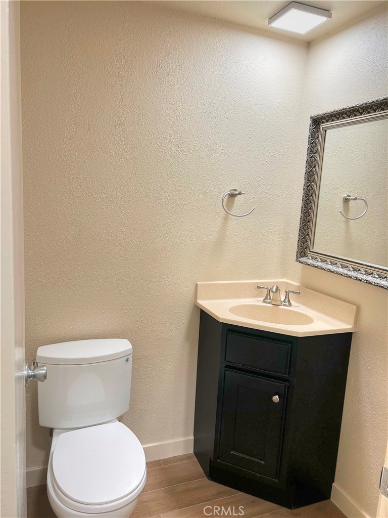 33938 Alcazar Drive, Unit A Dana Point, CA 92629 - Photo 15 of 29 a bathroom with a sink and a toilet