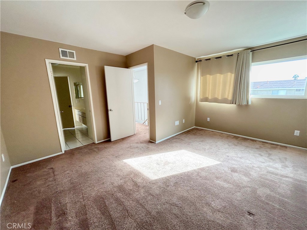 33938 Alcazar Drive, Unit A Dana Point, CA 92629 - Photo 19 of 29 an empty room with windows and closet