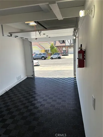 a view of a garden with houses