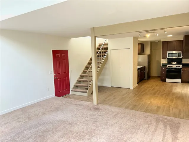 a view of a livingroom with a furniture