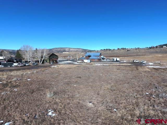 Tbd Hunter Parkway Ridgway, CO 81432 - Photo 8 of 12 a view of a road with a building in the background
