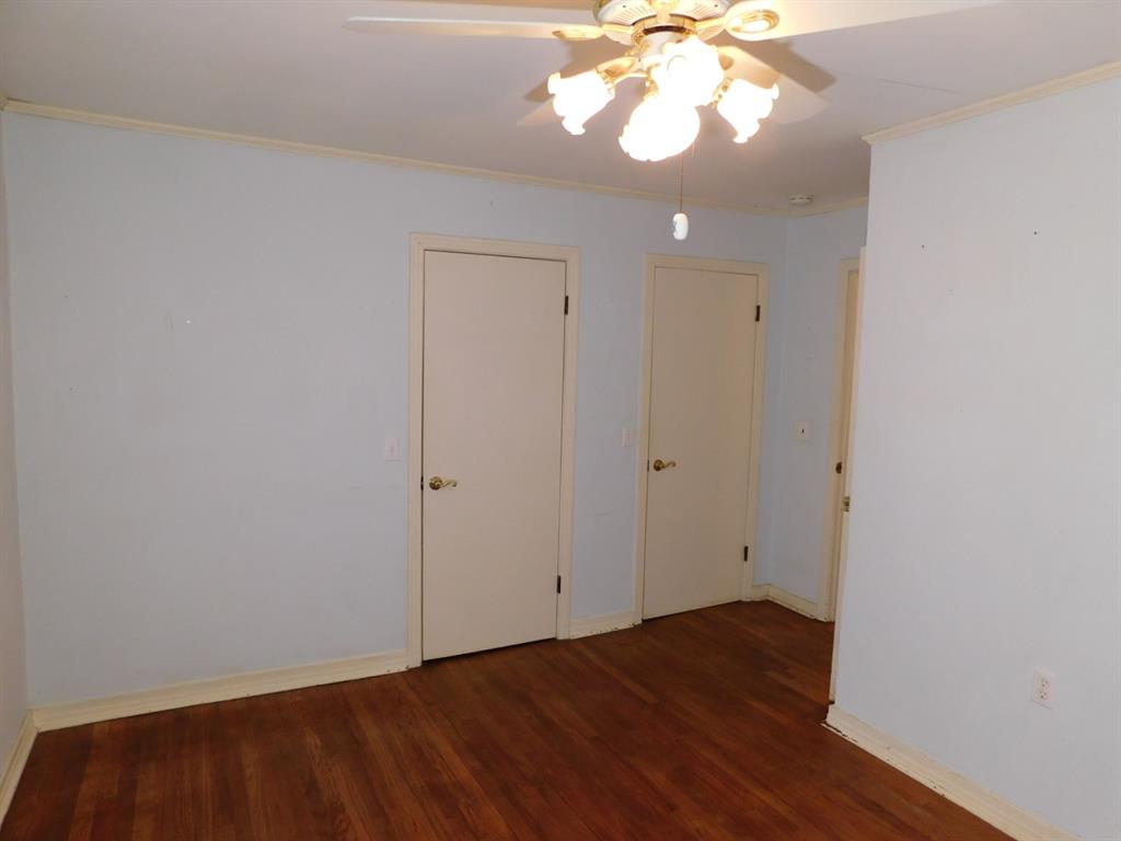24044 Highway 157 Springhill, LA 71075 - Photo 37 of 40 wooden floor in an empty room