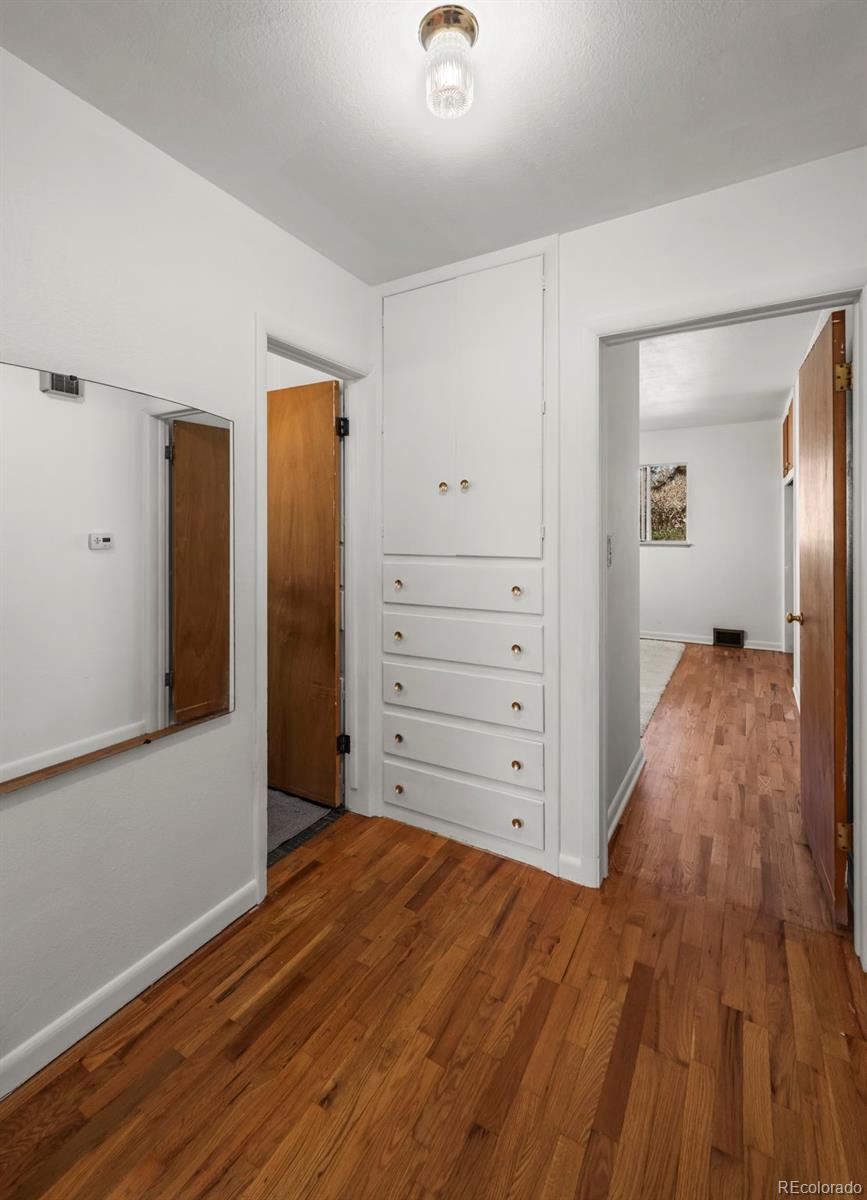 2935 17th Street Boulder, CO 80304 - Photo 12 of 38 a view of a bedroom with wooden floor