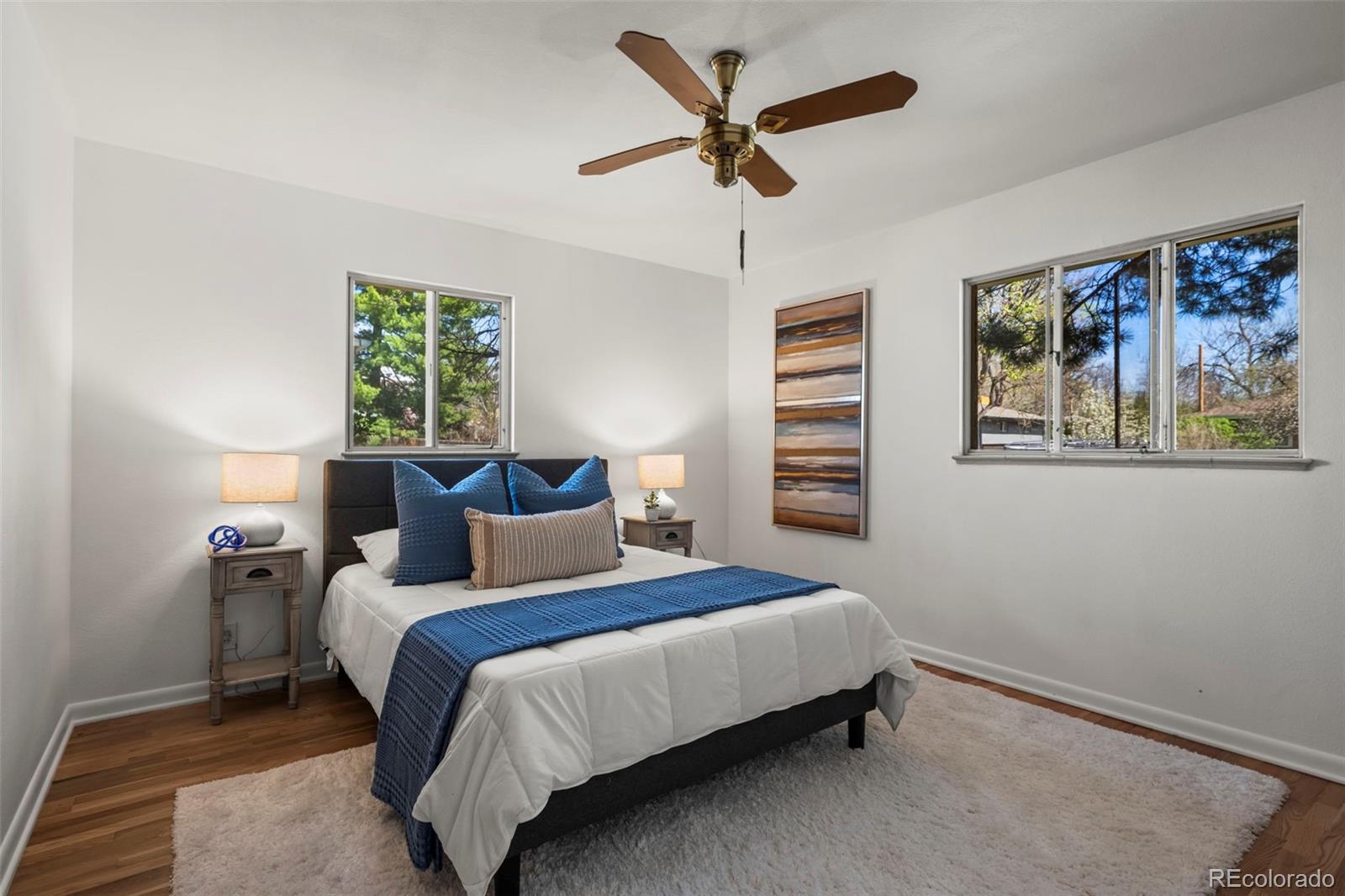 2935 17th Street Boulder, CO 80304 - Photo 14 of 38 a bedroom with a large bed and a window