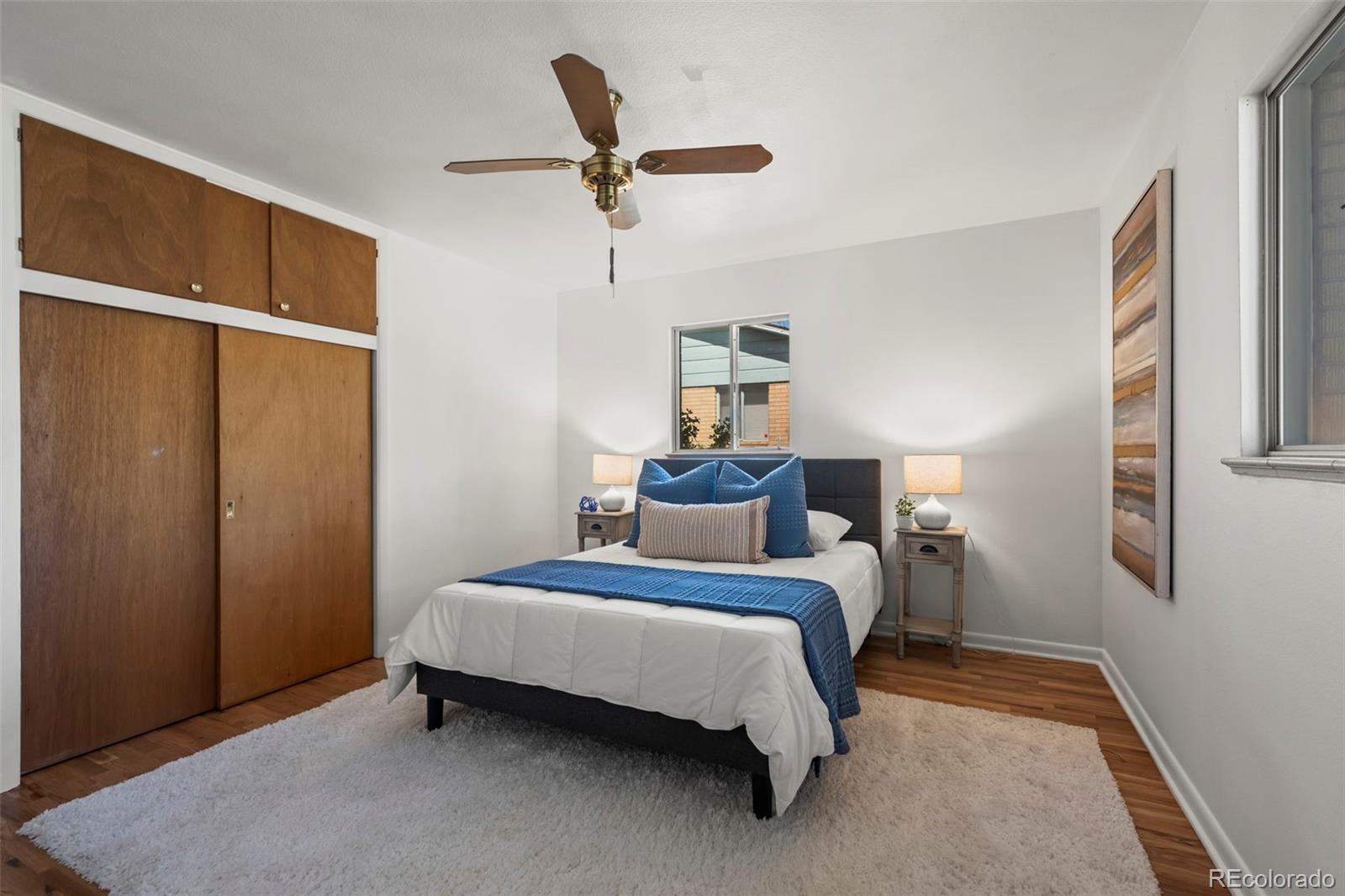 2935 17th Street Boulder, CO 80304 - Photo 15 of 38 a bedroom with a bed and a window