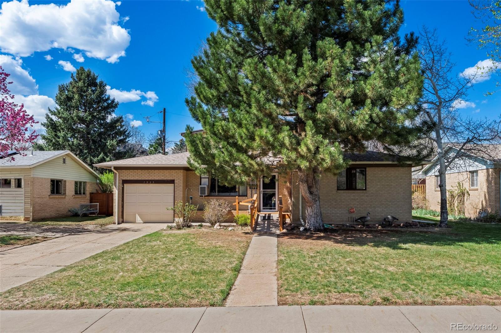 2935 17th Street Boulder, CO 80304 - Photo 2 of 38 front view of a house with a yard