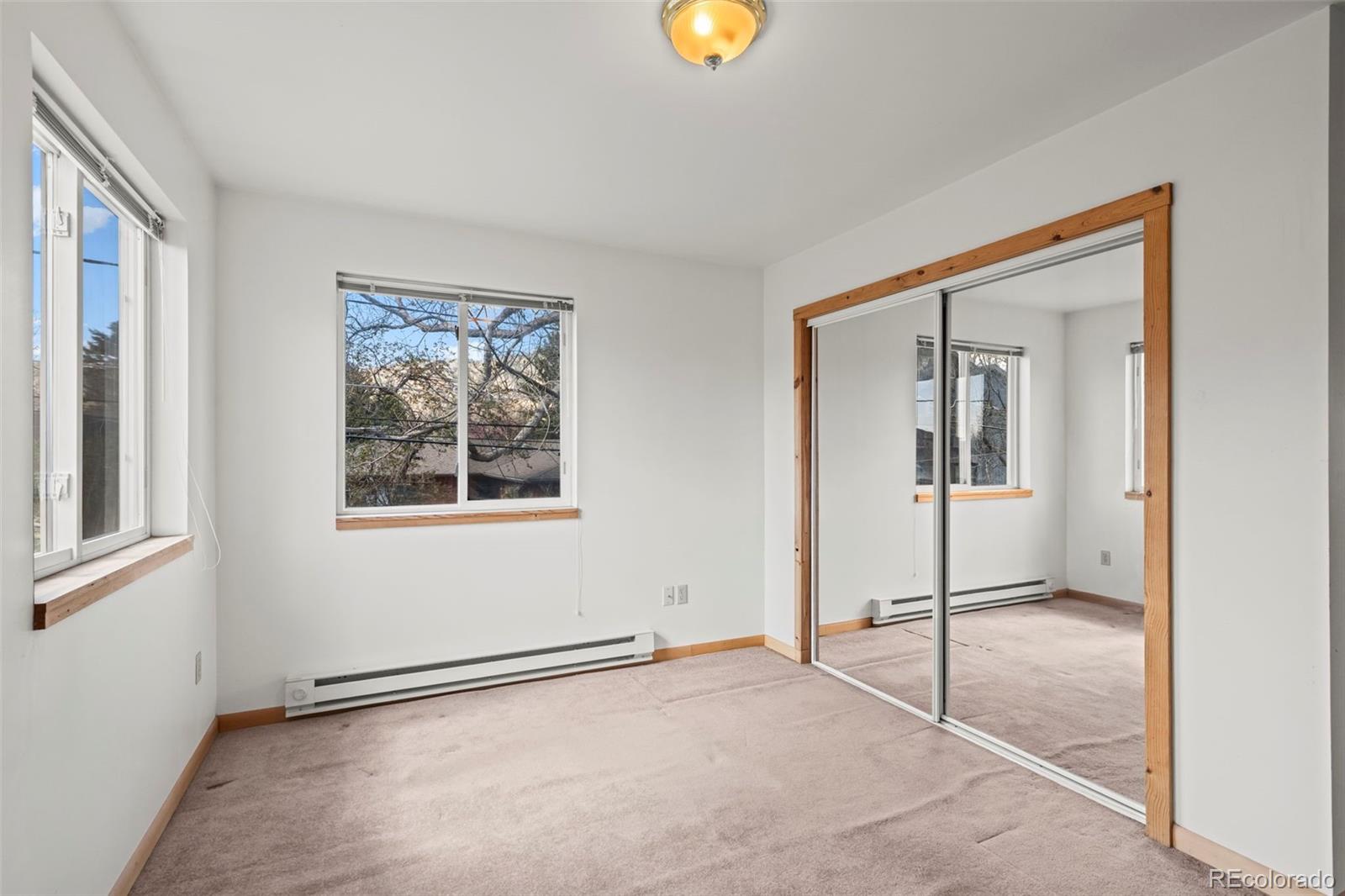 2935 17th Street Boulder, CO 80304 - Photo 26 of 38 a view of an empty room with window and closet area