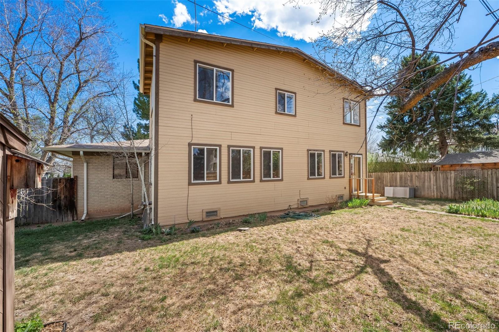2935 17th Street Boulder, CO 80304 - Photo 32 of 38 a house with trees in the background