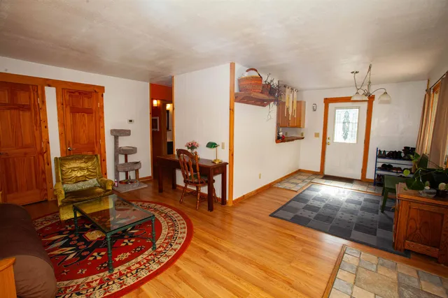 a view of a living room and dining room