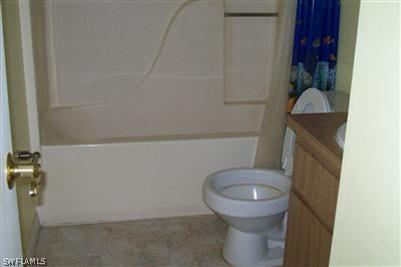 18423 Hawthorne Road Fort Myers, FL 33967 - Photo 3 of 3 a bathroom with a toilet and a sink