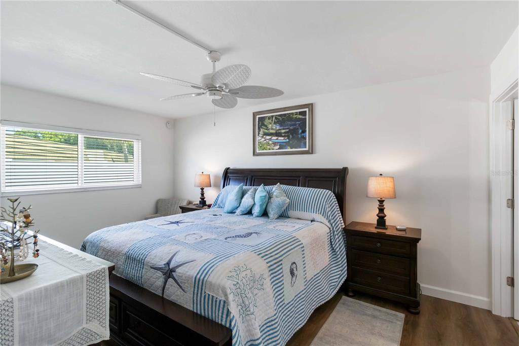 5416 Swift Road, Unit 27 Sarasota, FL 34231 - Photo 21 of 55 a bedroom with bed and a window