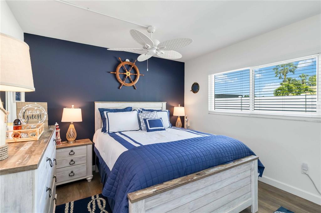 5416 Swift Road, Unit 27 Sarasota, FL 34231 - Photo 28 of 55 a bedroom with a bed and a window