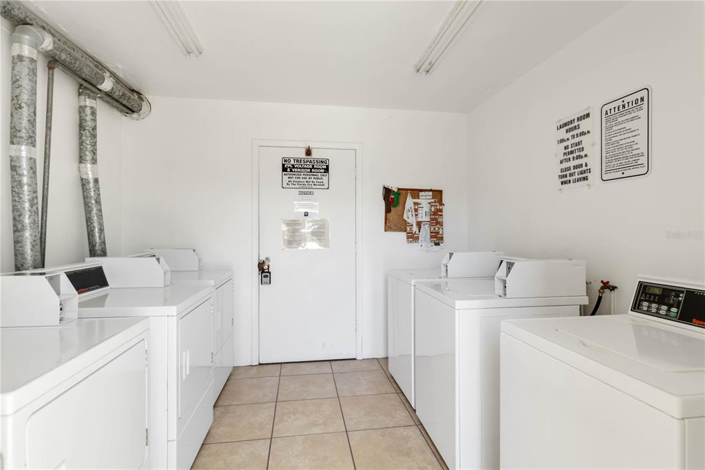 5416 Swift Road, Unit 27 Sarasota, FL 34231 - Photo 31 of 55 a bathroom with a sink a toilet and a mirror