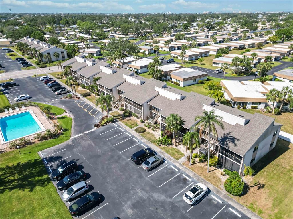 5416 Swift Road, Unit 27 Sarasota, FL 34231 - Photo 39 of 55 an aerial view of a house with a garden