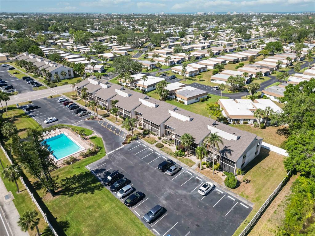 5416 Swift Road, Unit 27 Sarasota, FL 34231 - Photo 40 of 55 an aerial view of residential houses with outdoor space