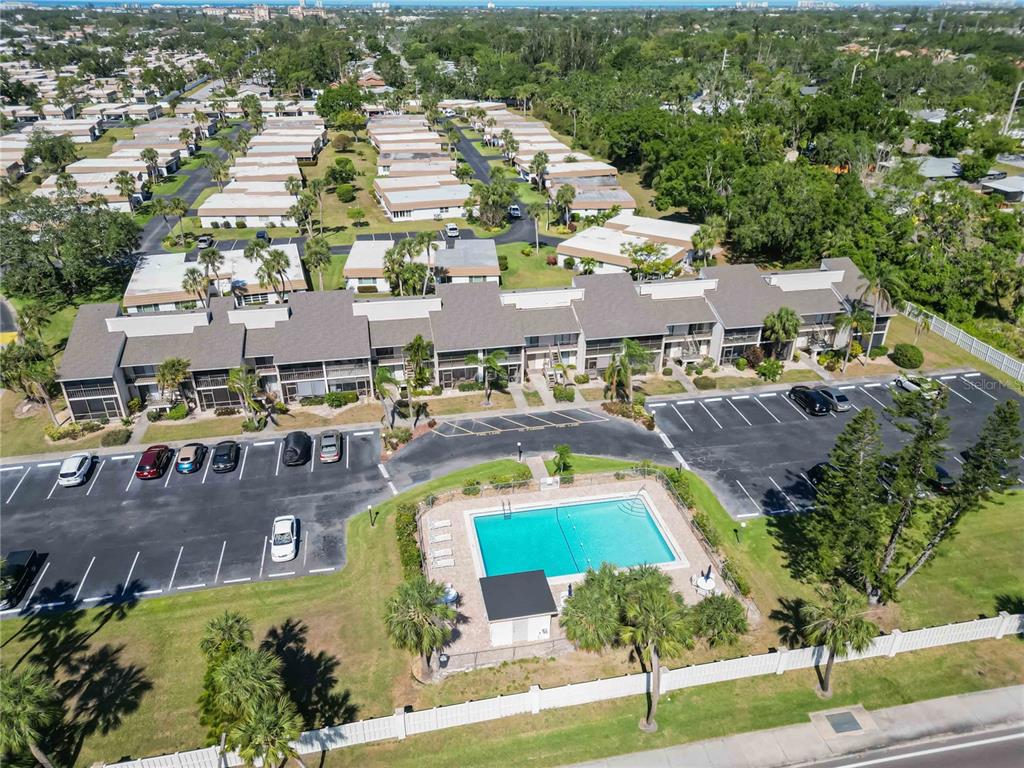 5416 Swift Road, Unit 27 Sarasota, FL 34231 - Photo 42 of 55 an aerial view of residential houses with yard