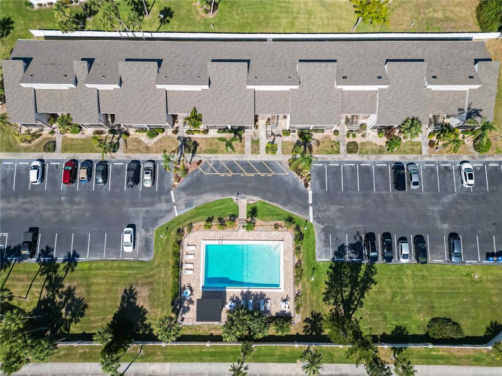 5416 Swift Road, Unit 27 Sarasota, FL 34231 - Photo 47 of 55 a front view of building with yard