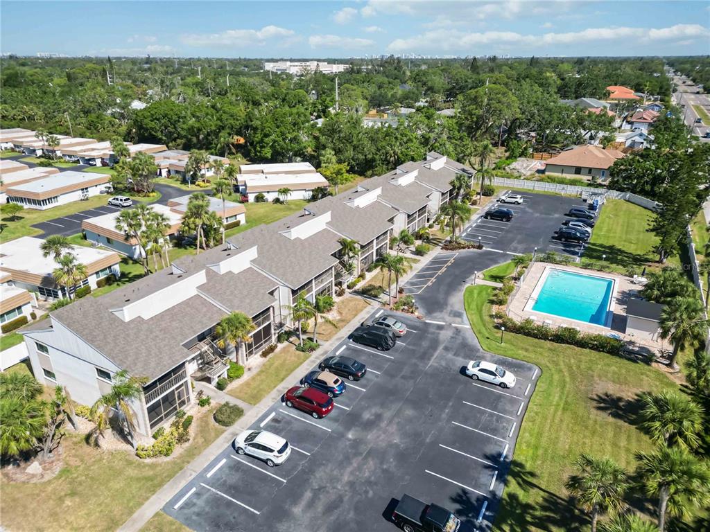 5416 Swift Road, Unit 27 Sarasota, FL 34231 - Photo 52 of 55 an aerial view of residential houses with outdoor space