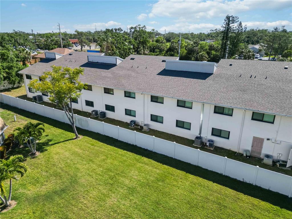 5416 Swift Road, Unit 27 Sarasota, FL 34231 - Photo 54 of 55 a view of a house with a swimming pool