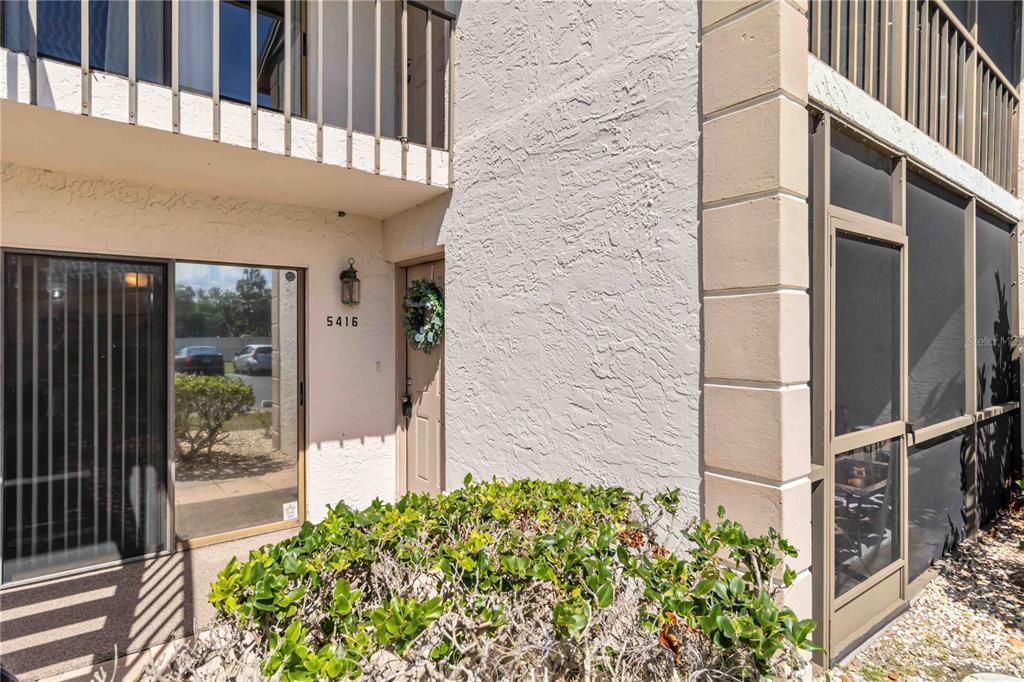 5416 Swift Road, Unit 27 Sarasota, FL 34231 - Photo 7 of 55 a view of a entrance gate of the house