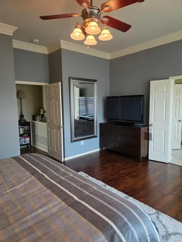 a view of a kitchen with a stove cabinets and wooden floor