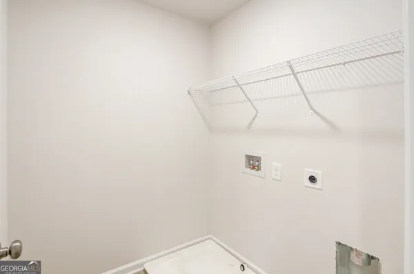 a house that has a big yard in front of it