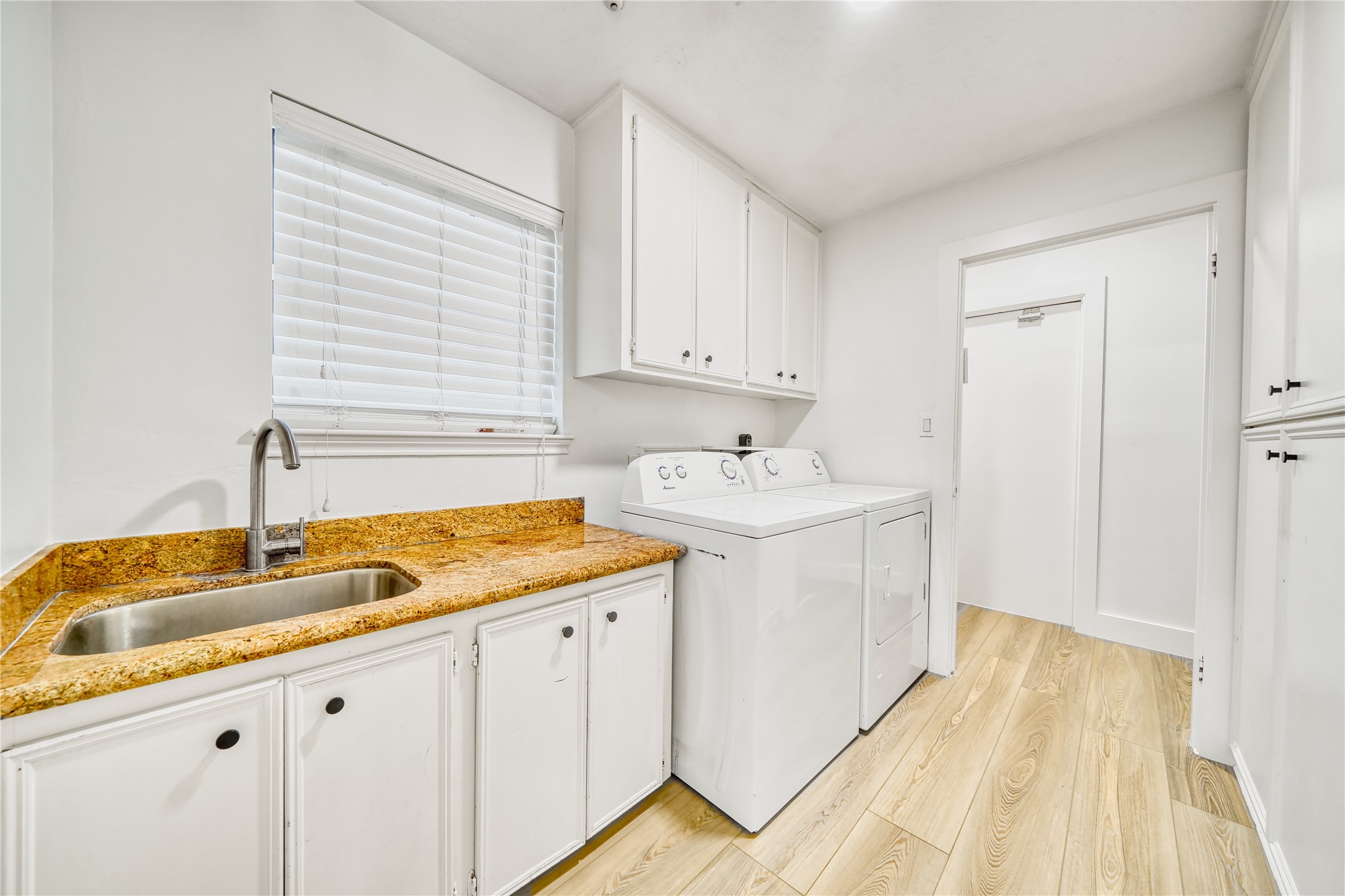 8006 Albin Lane Houston, TX 77071 - Photo 15 of 31 a utility room with cabinets