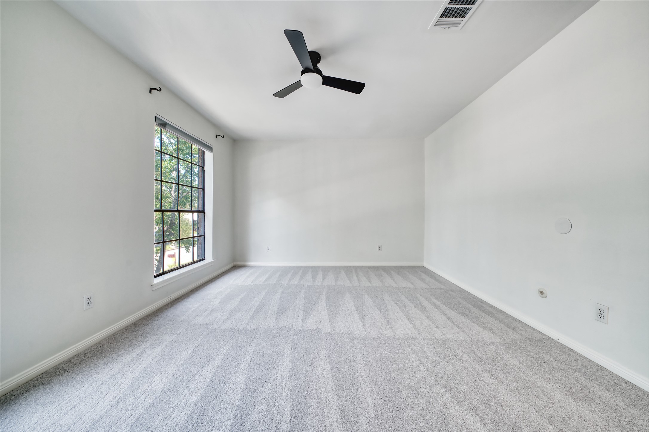 8006 Albin Lane Houston, TX 77071 - Photo 25 of 31 wooden floor in an empty room with a window