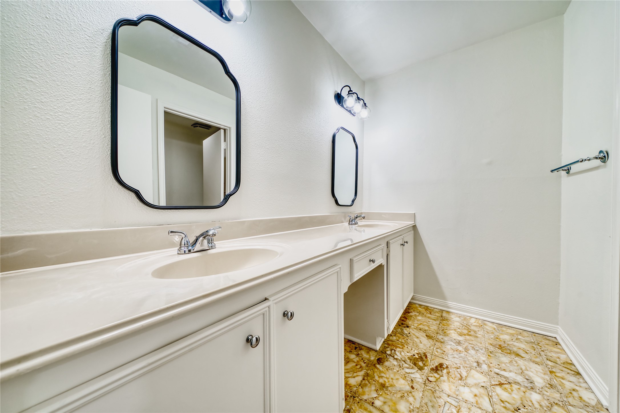 8006 Albin Lane Houston, TX 77071 - Photo 26 of 31 a bathroom with a sink and a mirror