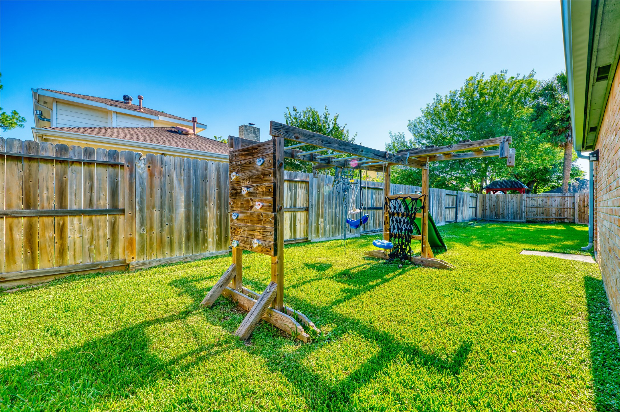 8006 Albin Lane Houston, TX 77071 - Photo 27 of 31 a view of a backyard with a slide