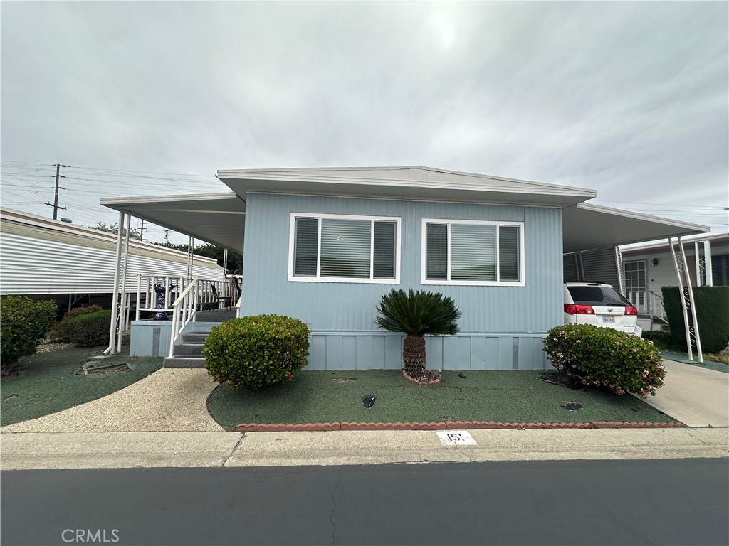 525 North Gilbert Street, Unit 151 Anaheim, CA 92801 - Photo 7 of 18 a house view with a outdoor space