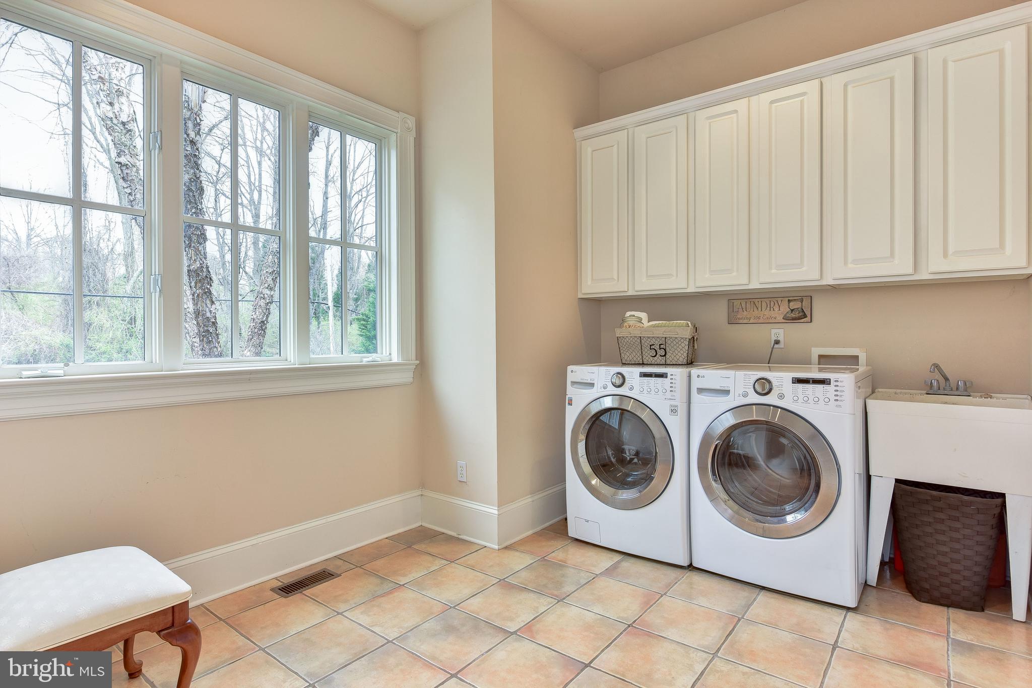 983 Spring Hill Road McLean, VA 22102 - Photo 16 of 41 Main level Laundry Room with two closets