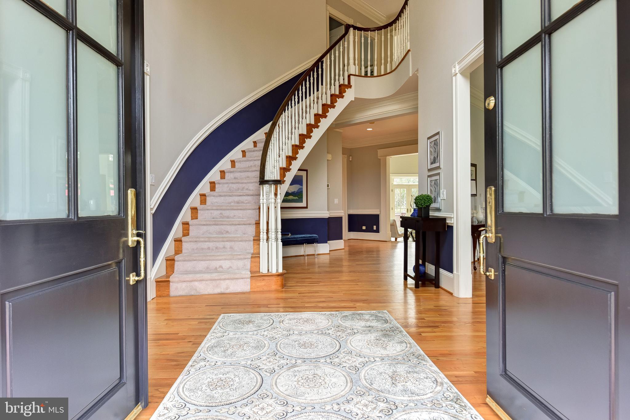 983 Spring Hill Road McLean, VA 22102 - Photo 3 of 41 Sweeping Staircase in Entry Foyer