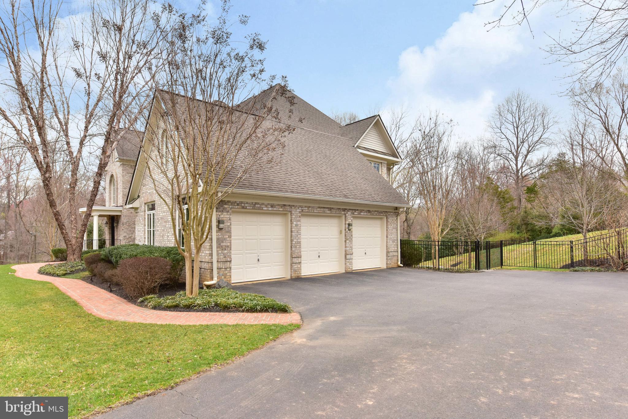 983 Spring Hill Road McLean, VA 22102 - Photo 40 of 41 Side loading three car garage with brick walkway