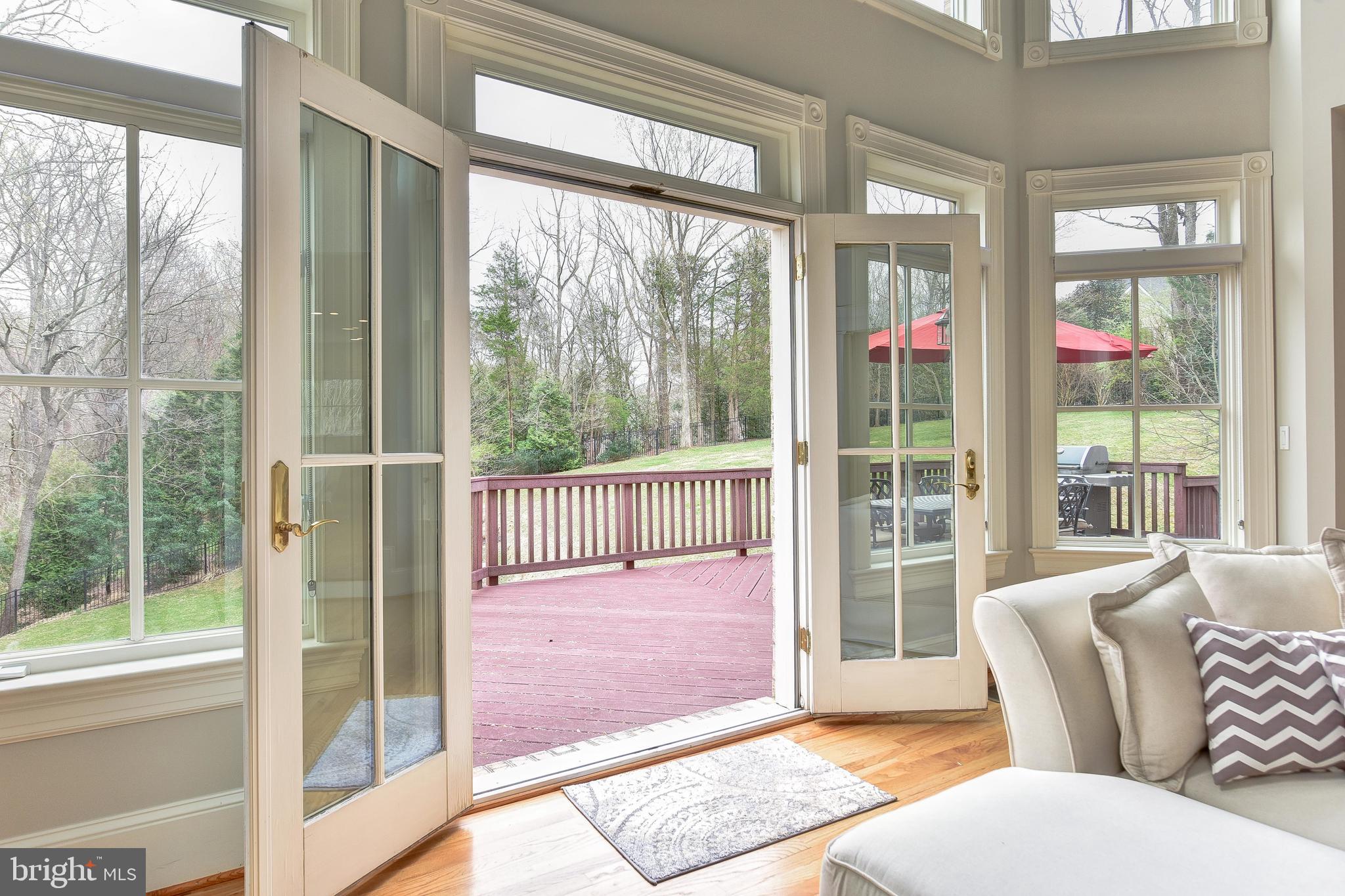 983 Spring Hill Road McLean, VA 22102 - Photo 7 of 41 French doors from Family Room to expansive deck