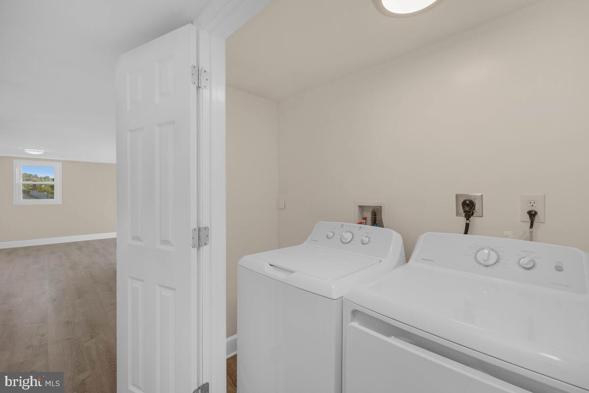 332 Ridge Road, Unit A Westminster, MD 21157 - Photo 15 of 21 a utility room with dryer and washer