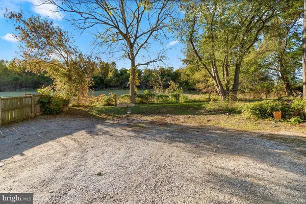 a view of backyard with green space