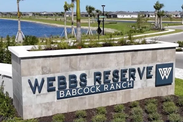a view of a street with a building in the background