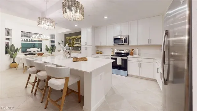 a front view of a building with sitting area