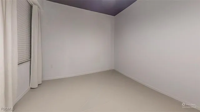 a bathroom with a double vanity sink a mirror and a shower