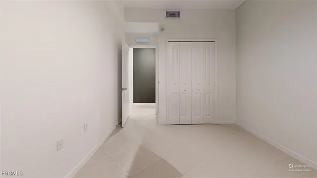 a bathroom with a sink vanity and mirror