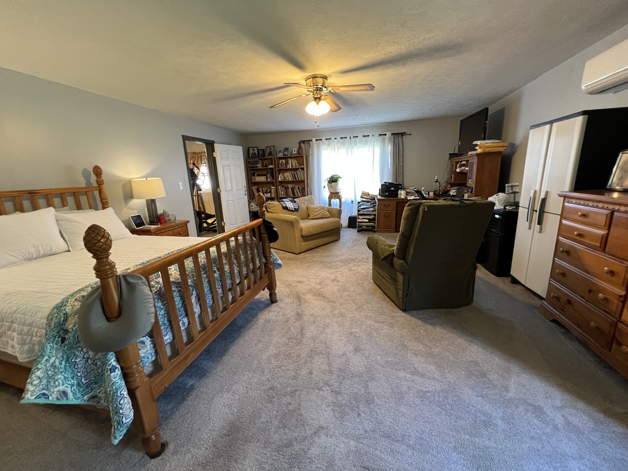 1076 Southside Road Southside, TN 37171 - Photo 11 of 27 a bed room with furniture and a chandelier