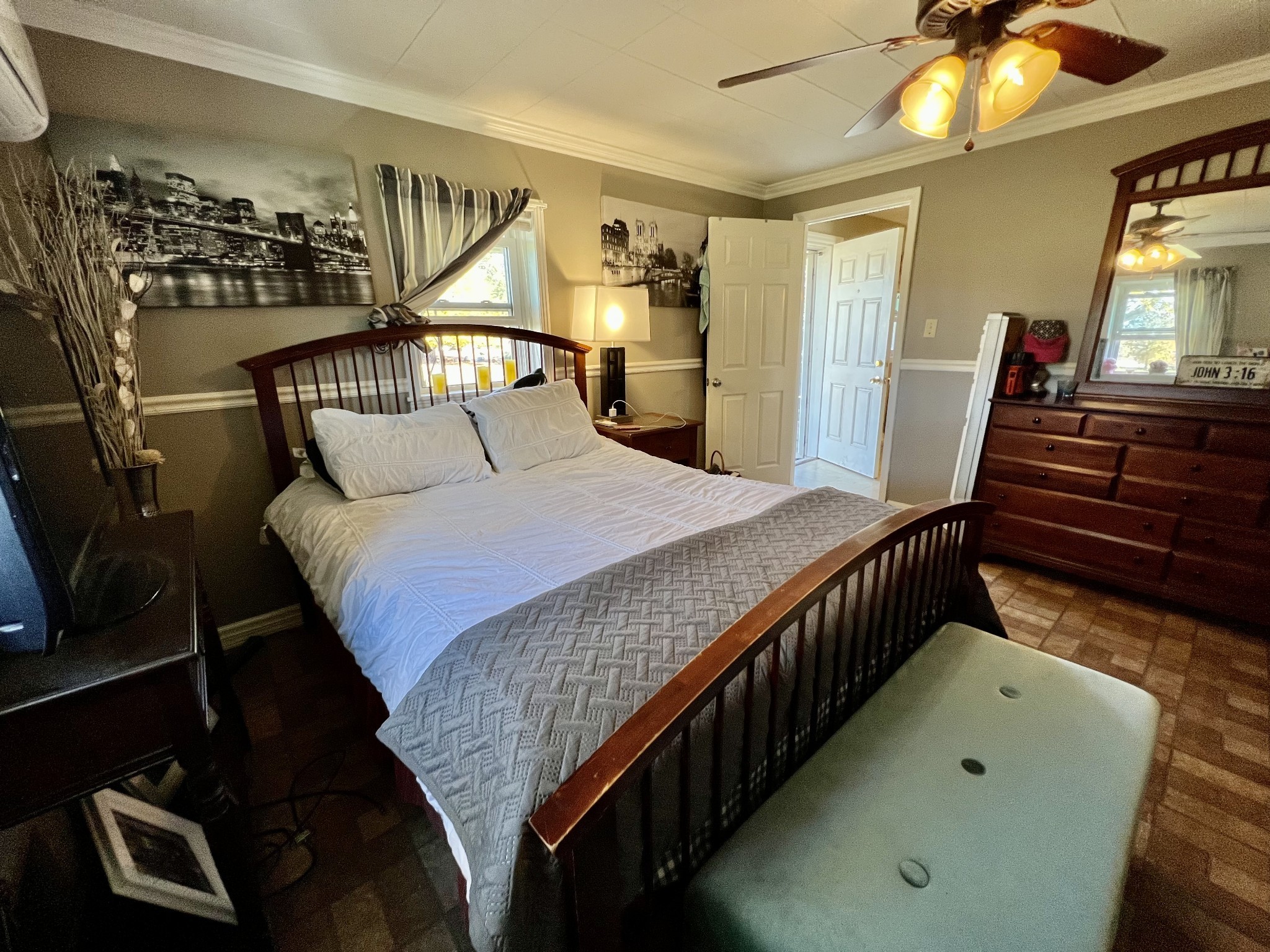 1076 Southside Road Southside, TN 37171 - Photo 13 of 27 a bedroom with a bed and a chandelier