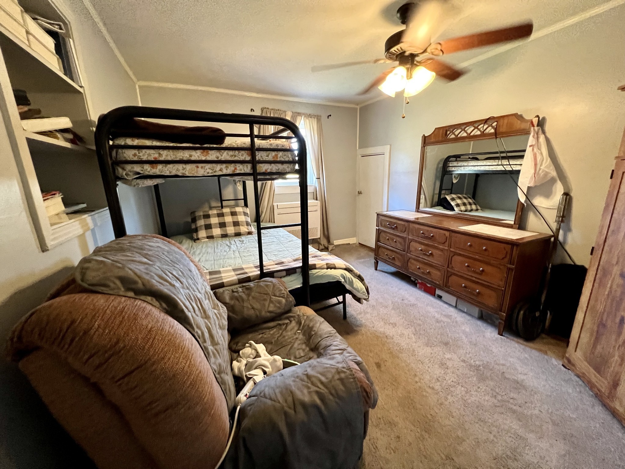 1076 Southside Road Southside, TN 37171 - Photo 15 of 27 a bedroom with a bed and a fireplace