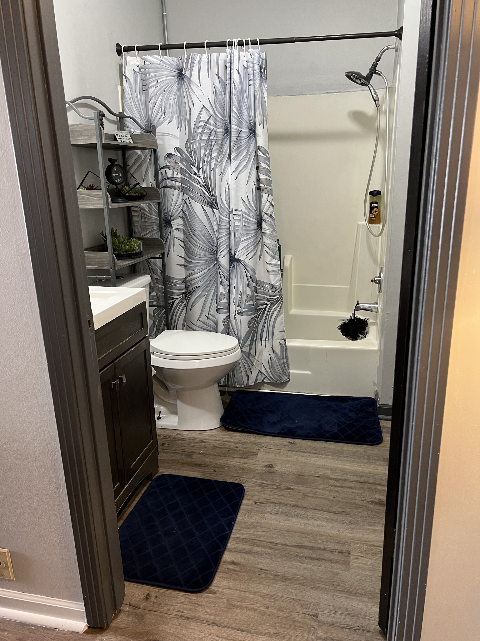 1076 Southside Road Southside, TN 37171 - Photo 22 of 27 a bathroom with a sink a toilet a shower and a mirror